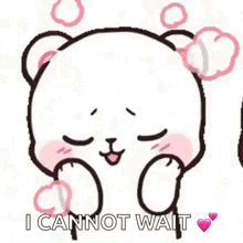a teddy bear with a bow on its head is holding its paws in front of its face .