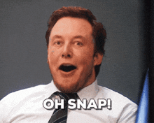 a man in a white shirt and tie is saying " oh snap "
