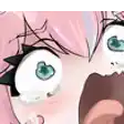 a close up of a cartoon character 's face with a surprised expression .