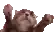 a pixel art of a cat laying on its back with its paws up .