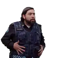 a man with a beard is wearing a vest that says j.r. interia on it