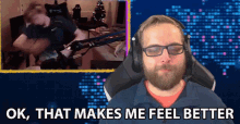 a man with glasses and headphones is sitting in front of a screen that says ok that makes me feel better