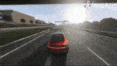 a red car is driving down a highway and the word simpleng is on the bottom right
