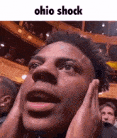 a close up of a man 's face with the words ohio shock above it .