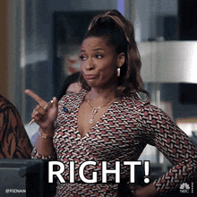 a woman with a pen in her hand points to the right and says right