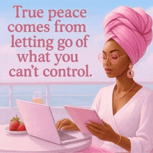 a woman wearing a pink turban is sitting at a table with a laptop and a tablet .