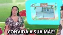 a woman is standing in front of a television screen with the words convida a sua mae .
