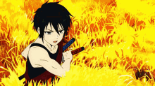 a boy in a tank top is holding a sword in a field of fire