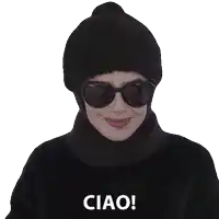 a woman wearing sunglasses and a black hat with the word ciao on the bottom