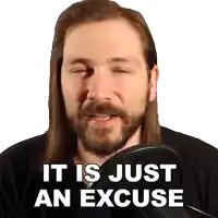 a man with long hair and a beard is speaking into a microphone with the words it is just an excuse below him