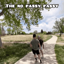 two men are walking down a path with the words " the no passy passy " written above them