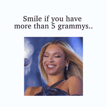 a picture of a smiling blonde woman with the caption smile if you have more than 5 grammys