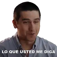 a man in a blue shirt with the words lo que usted me diga below him