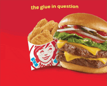 a wendy 's advertisement with a double cheeseburger and nuggets on a red background
