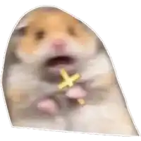 a hamster is holding a cross in its mouth .