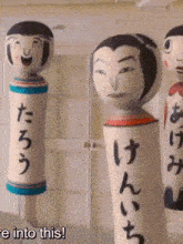 a group of dolls are standing next to each other with the words " e into this " above them